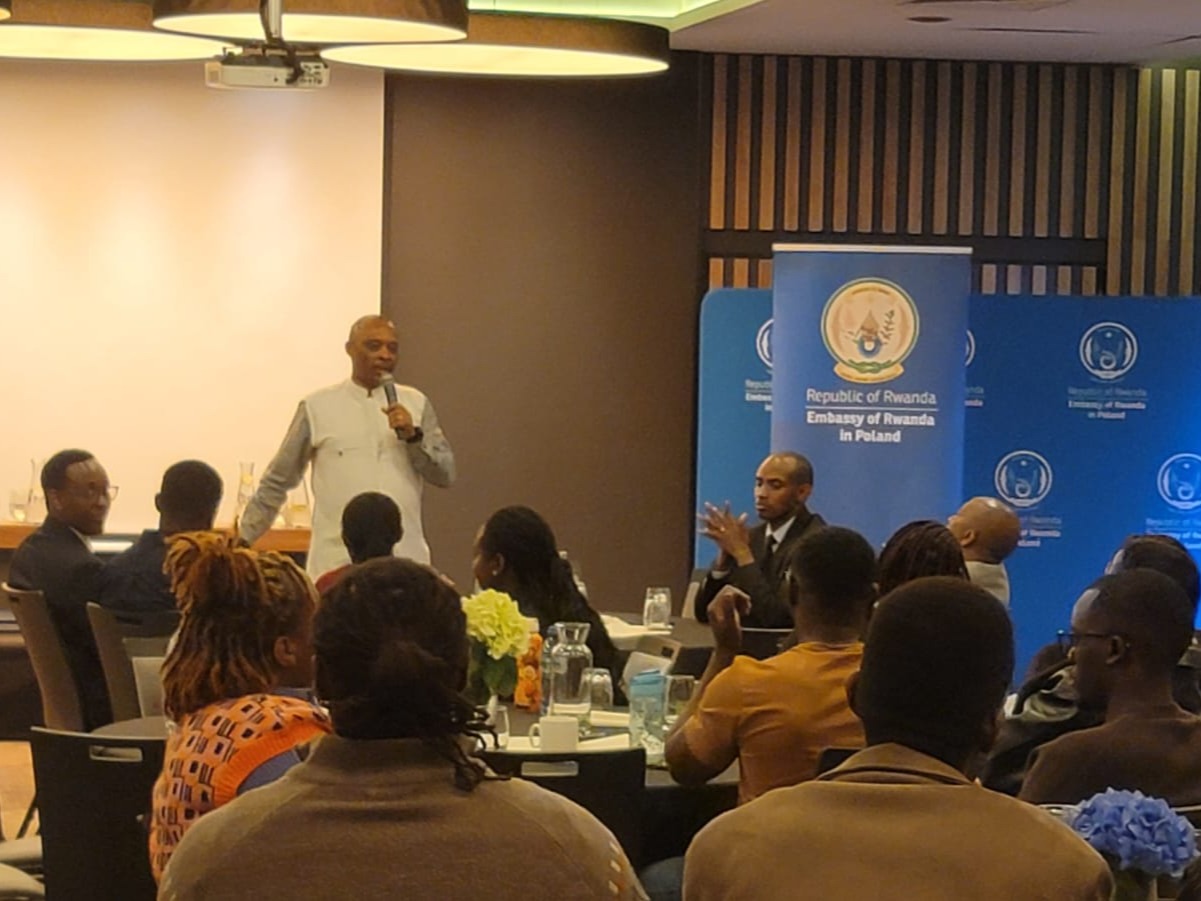 Embassy official addressing the Rwandan community during the Kraków outreach session